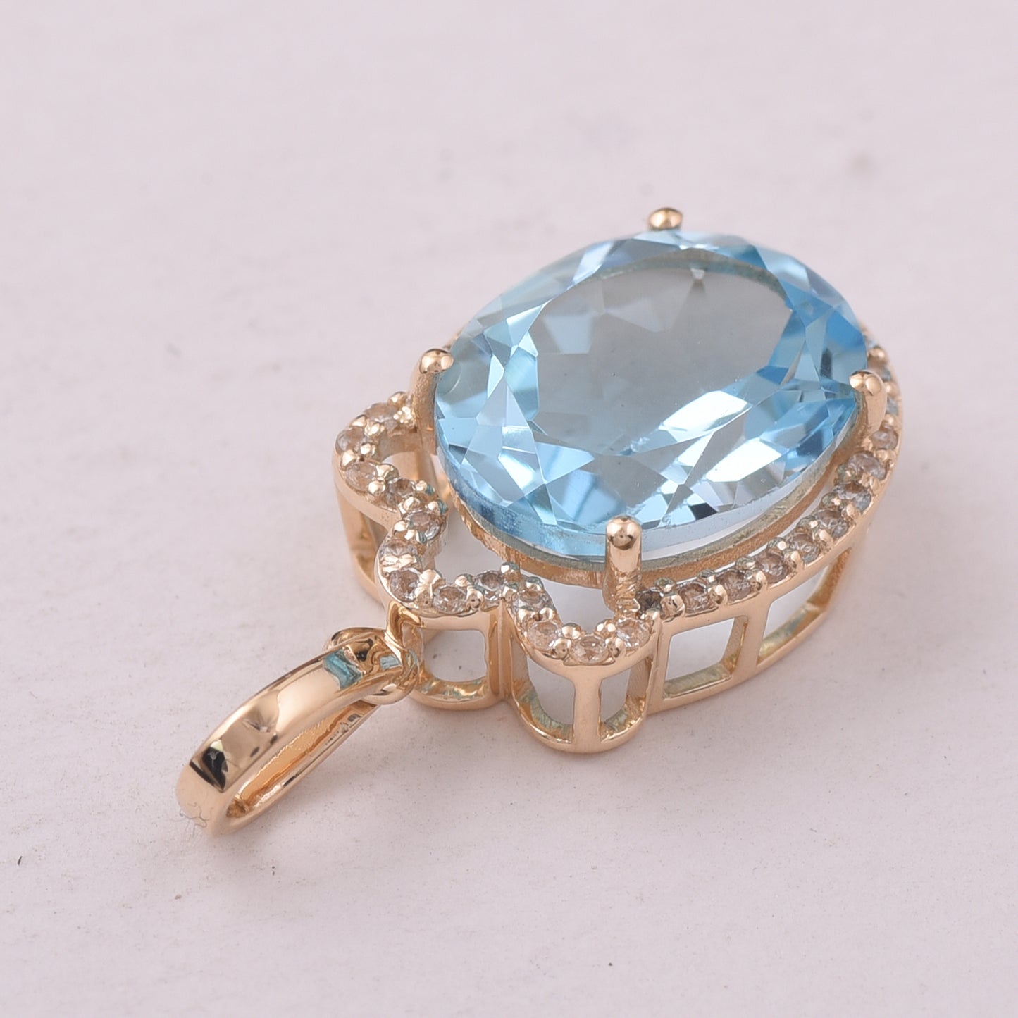 4.64 Ct Oval Blue Topaz 9K Gold Pendant