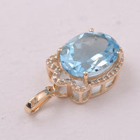 4.64 Ct Oval Blue Topaz 9K Gold Pendant