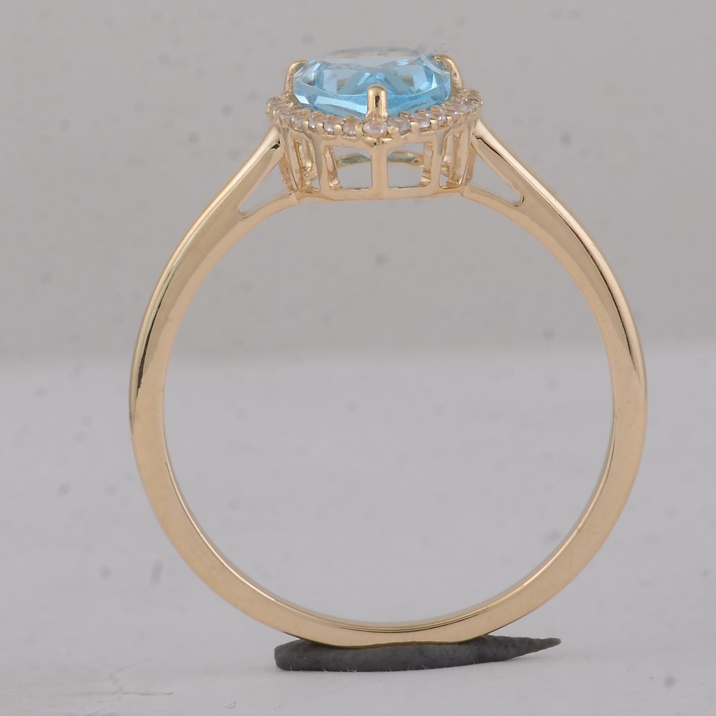 1.74 Ct Pear Blue Topaz 9K Gold Ring