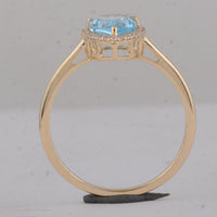 1.74 Ct Pear Blue Topaz 9K Gold Ring