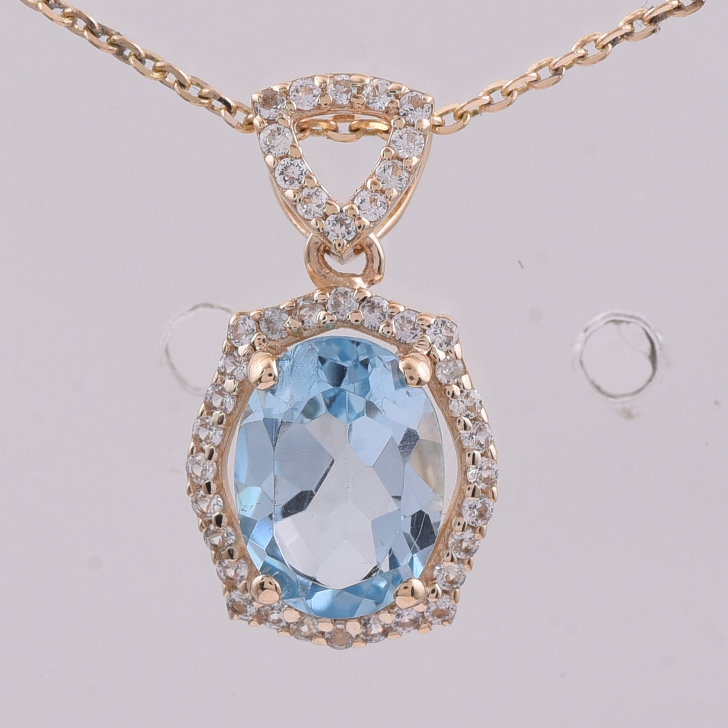 1.55 Ct Oval Blue Topaz 9K Gold Pendant
