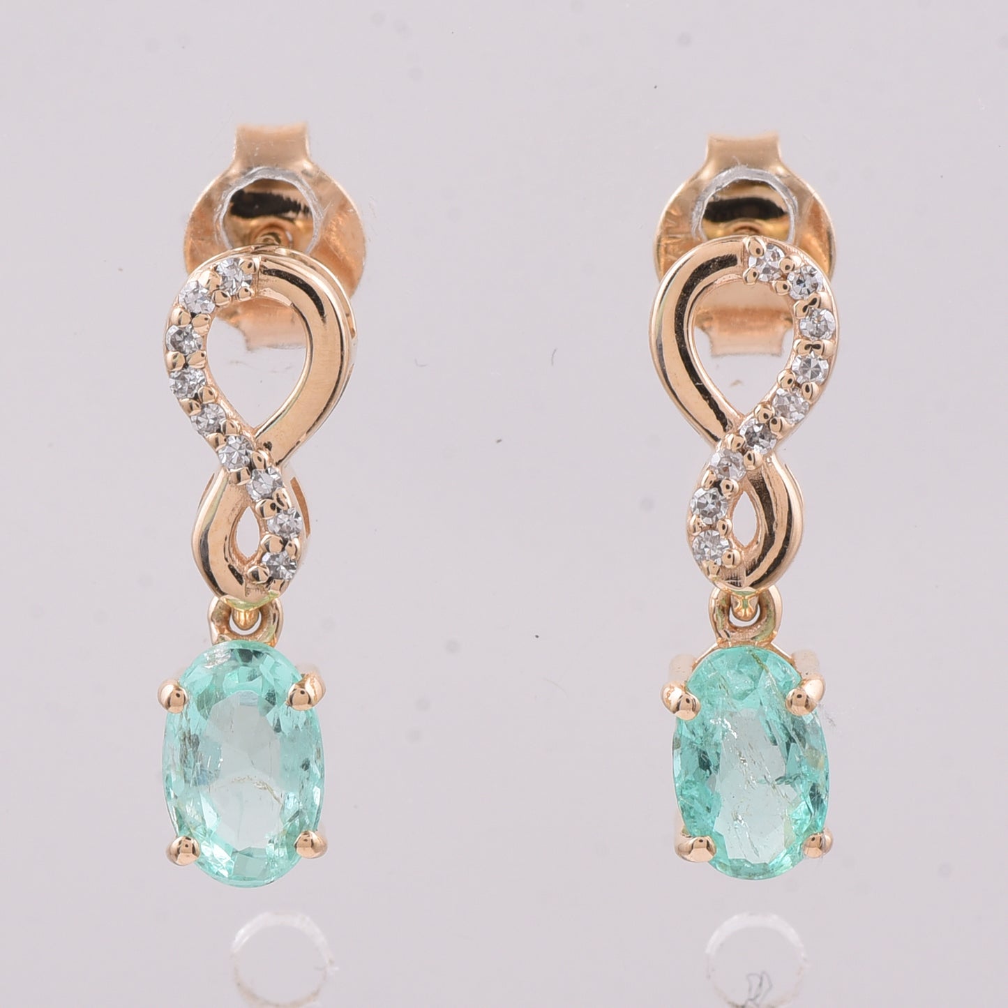 0.85 Ct Oval Natural Emerald 14K Gold Earrings