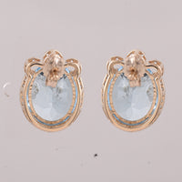 9.24 Ct Oval Blue Topaz 9K Gold Earrings