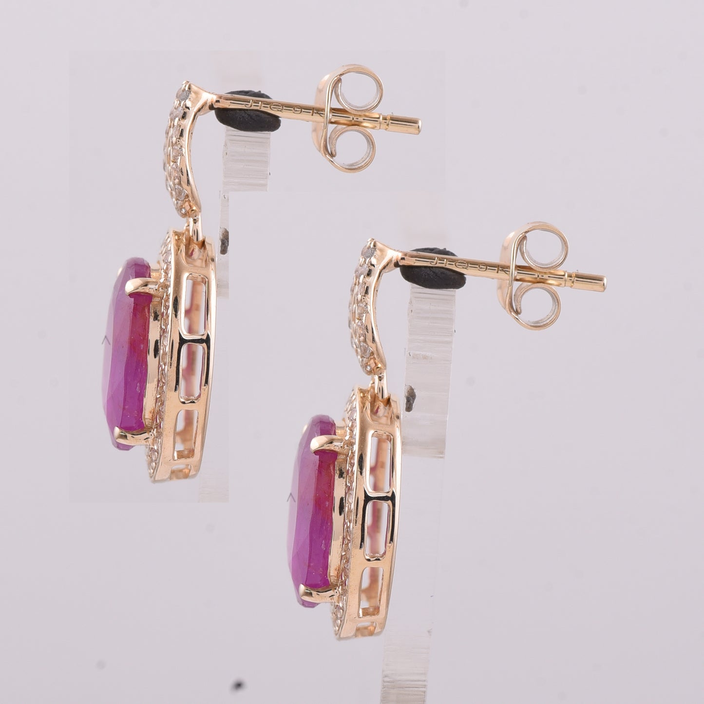 6.89 Ct Oval Ruby 9K Gold Earrings
