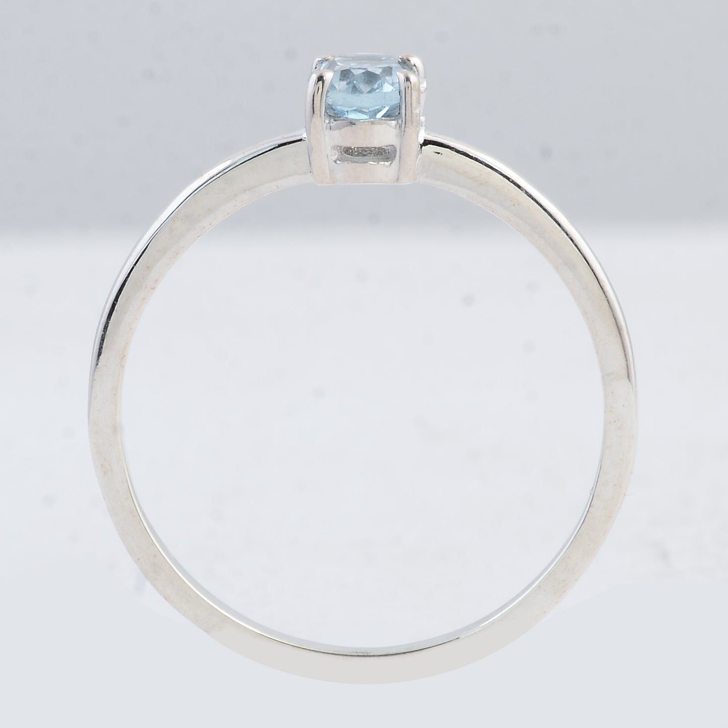 0.45 Ct Oval Swiss Blue Topaz 925 Sterling Silver Ring