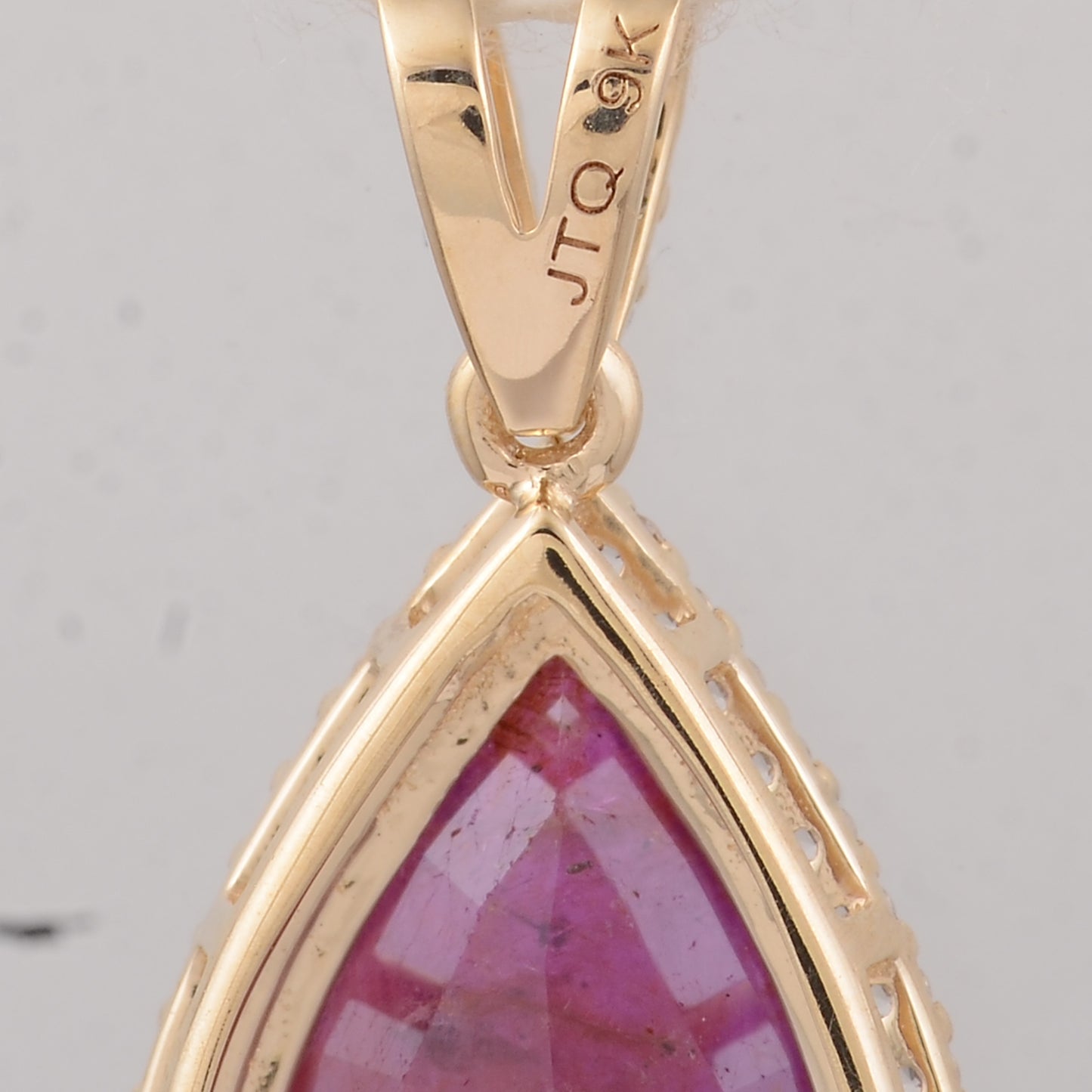 3.49 Ct Pear Ruby 9K Gold Pendant