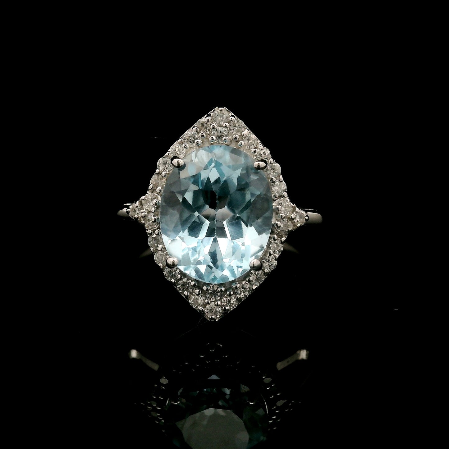 3.57 Ct Oval Blue Topaz, White Zircon 925 Sterling Silver Ring