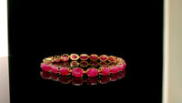 22.70 Ct Oval Ruby 14K Gold Bracelet