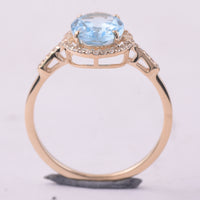 2.24 Ct Oval Blue Topaz 9K Gold Ring