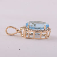 4.64 Ct Oval Blue Topaz 9K Gold Pendant