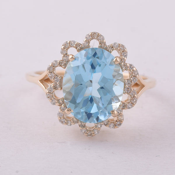 4.72 Ct Oval Blue Topaz 9K Gold Ring