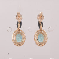 1.73 Ct Oval Emerald 9K Gold Earrings