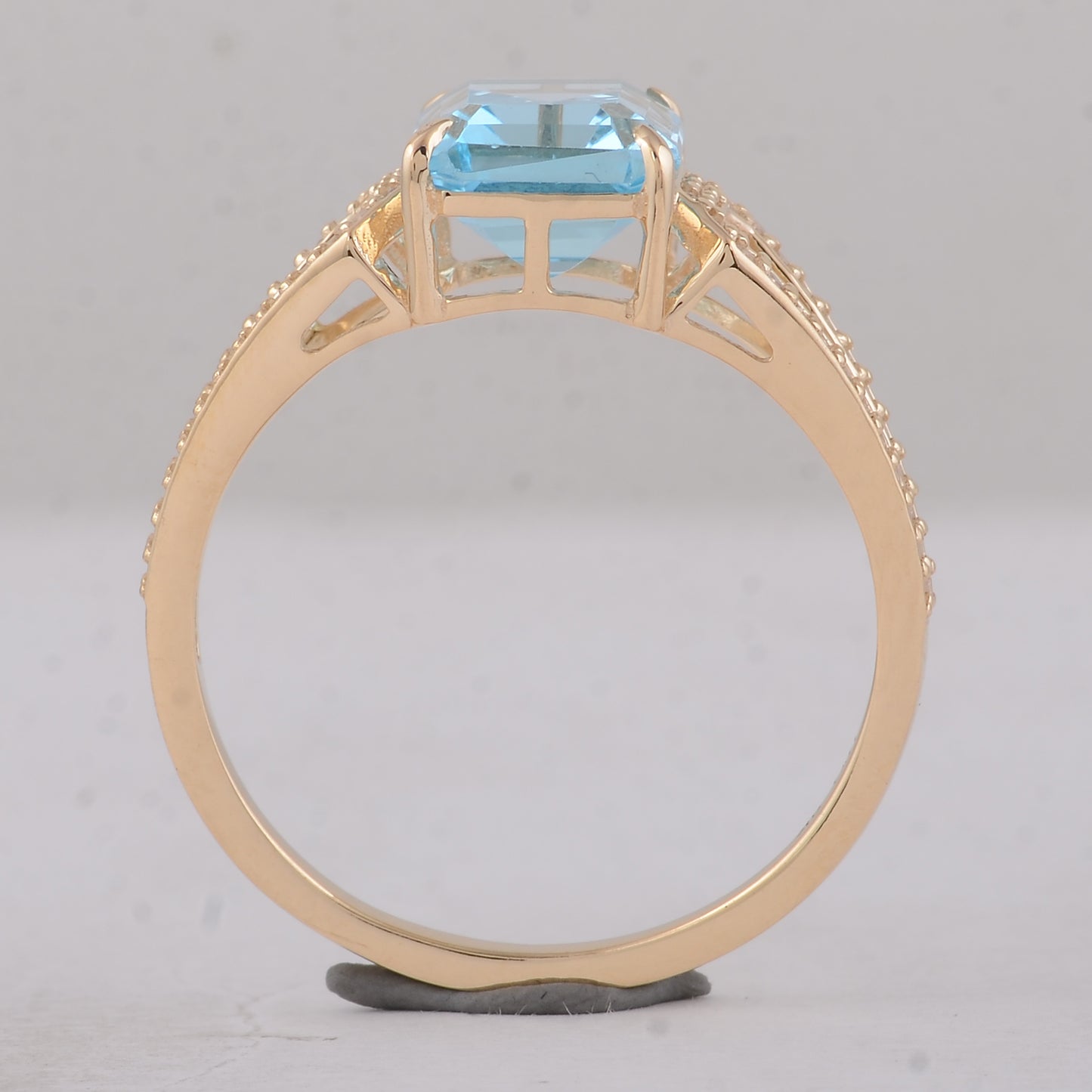 3.04 Ct Octagon Blue Topaz 9K Gold Ring