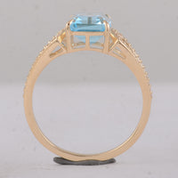 3.04 Ct Octagon Blue Topaz 9K Gold Ring