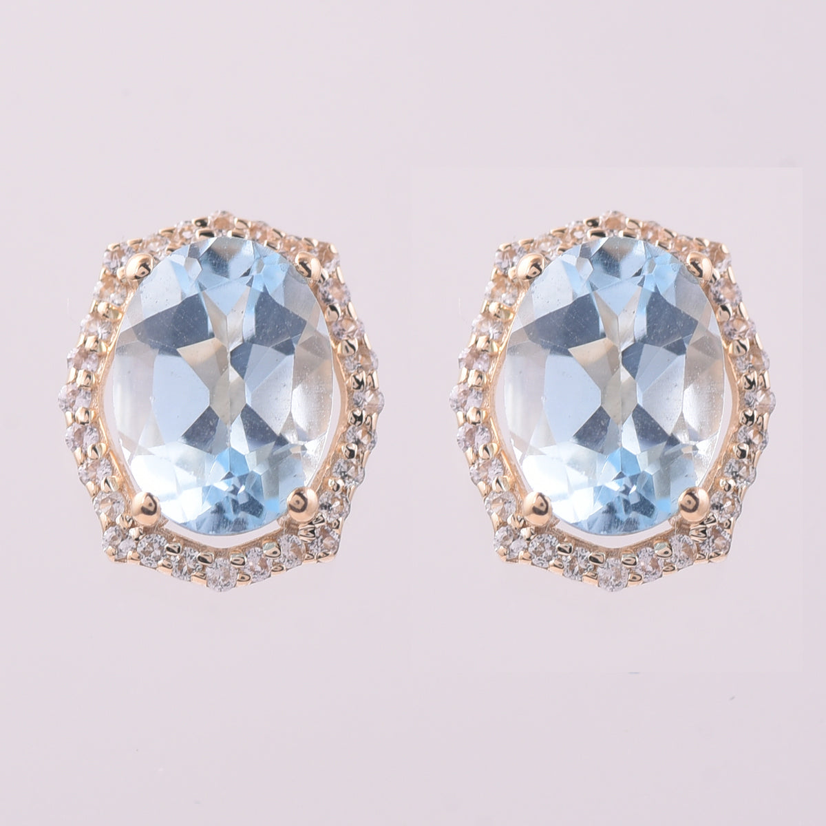 3.14 Ct Oval Blue Topaz 9K Gold Earrings