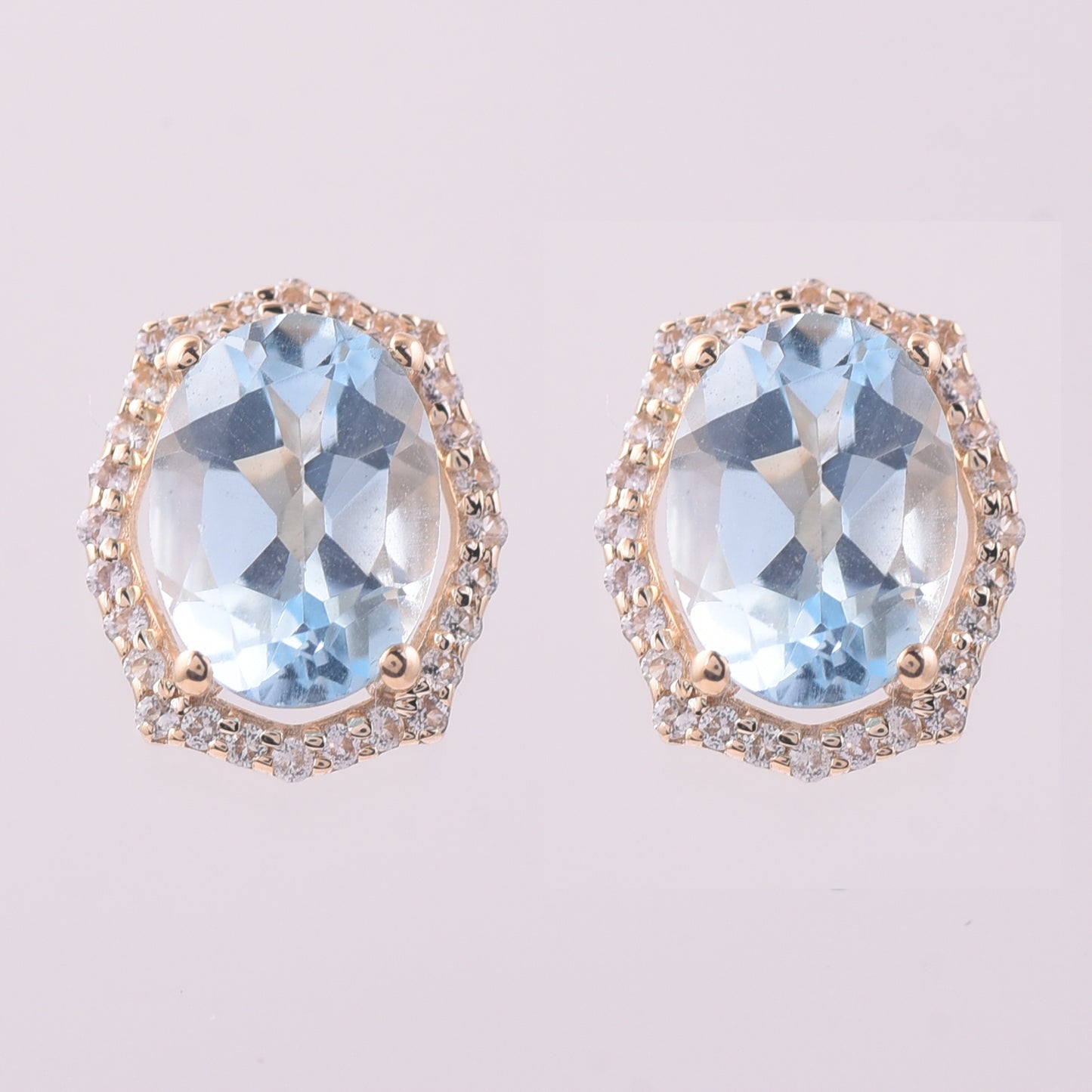 3.14 Ct Oval Blue Topaz 9K Gold Earrings