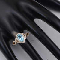 1.87 Ct Pear Blue Topaz 9K Gold Ring