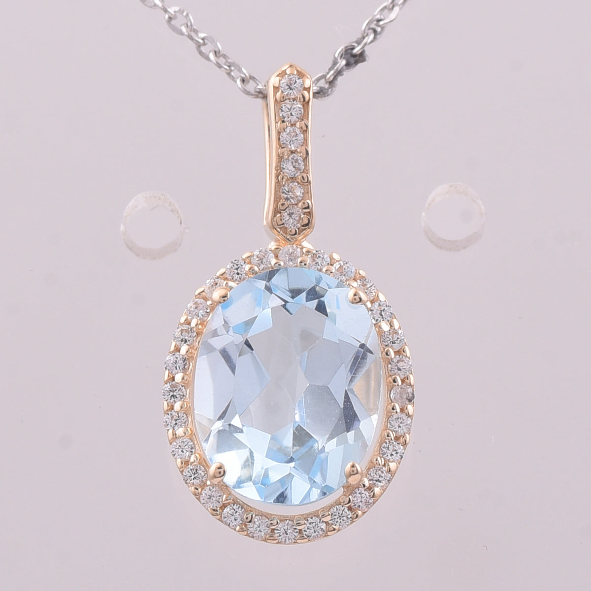 2.26 Ct Oval Blue Topaz 9K Gold Pendant