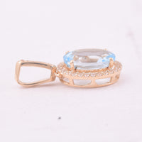2.26 Ct Oval Blue Topaz 9K Gold Pendant