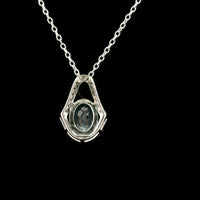 1.61 Ct Oval Blue Topaz, White Zircon 925 Sterling Silver Pendant