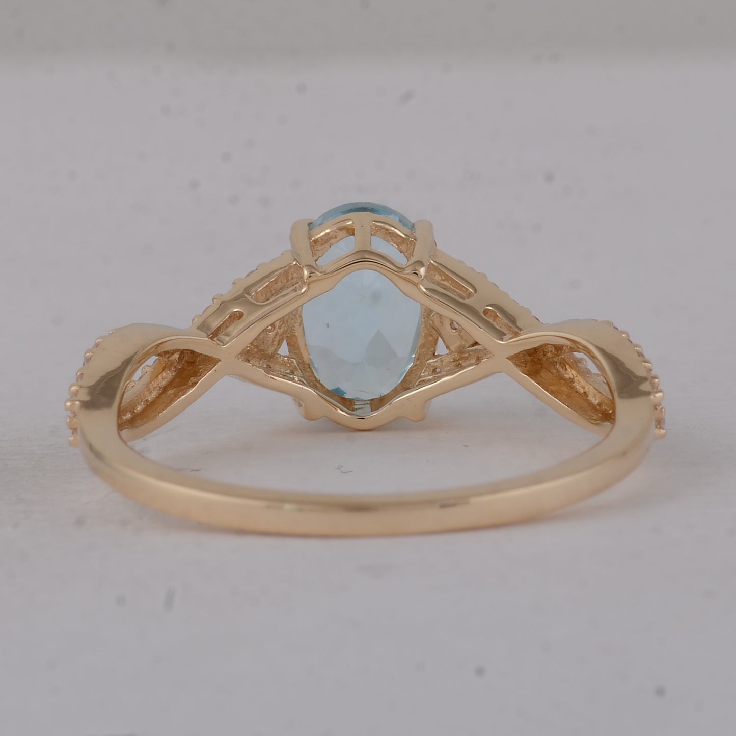 1.60 Ct Oval Blue Topaz 9K Gold Ring