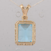 4.25 Ct Octagon Blue Topaz 9K Gold Pendant