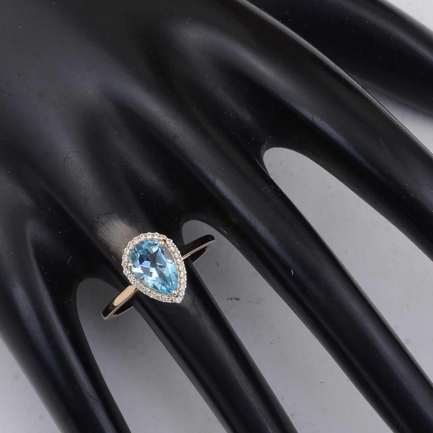 1.74 Ct Pear Blue Topaz 9K Gold Ring