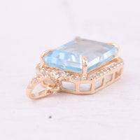 4.41 Ct Octagon Blue Topaz 9K Gold Pendant
