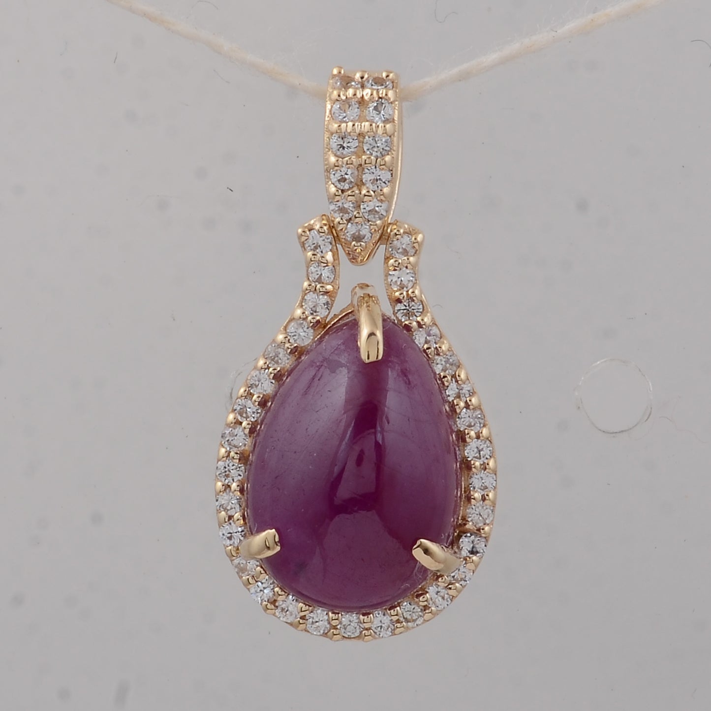 3.85 Ct Pear Ruby 9K Gold Pendant
