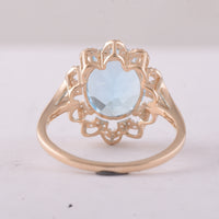 4.72 Ct Oval Blue Topaz 9K Gold Ring