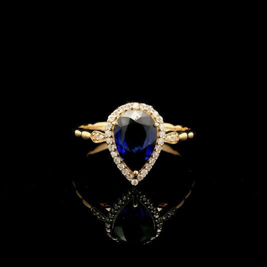 1.67 Ct Pear Mixed Cut Lab Grown Sapphire 14K Gold Ring