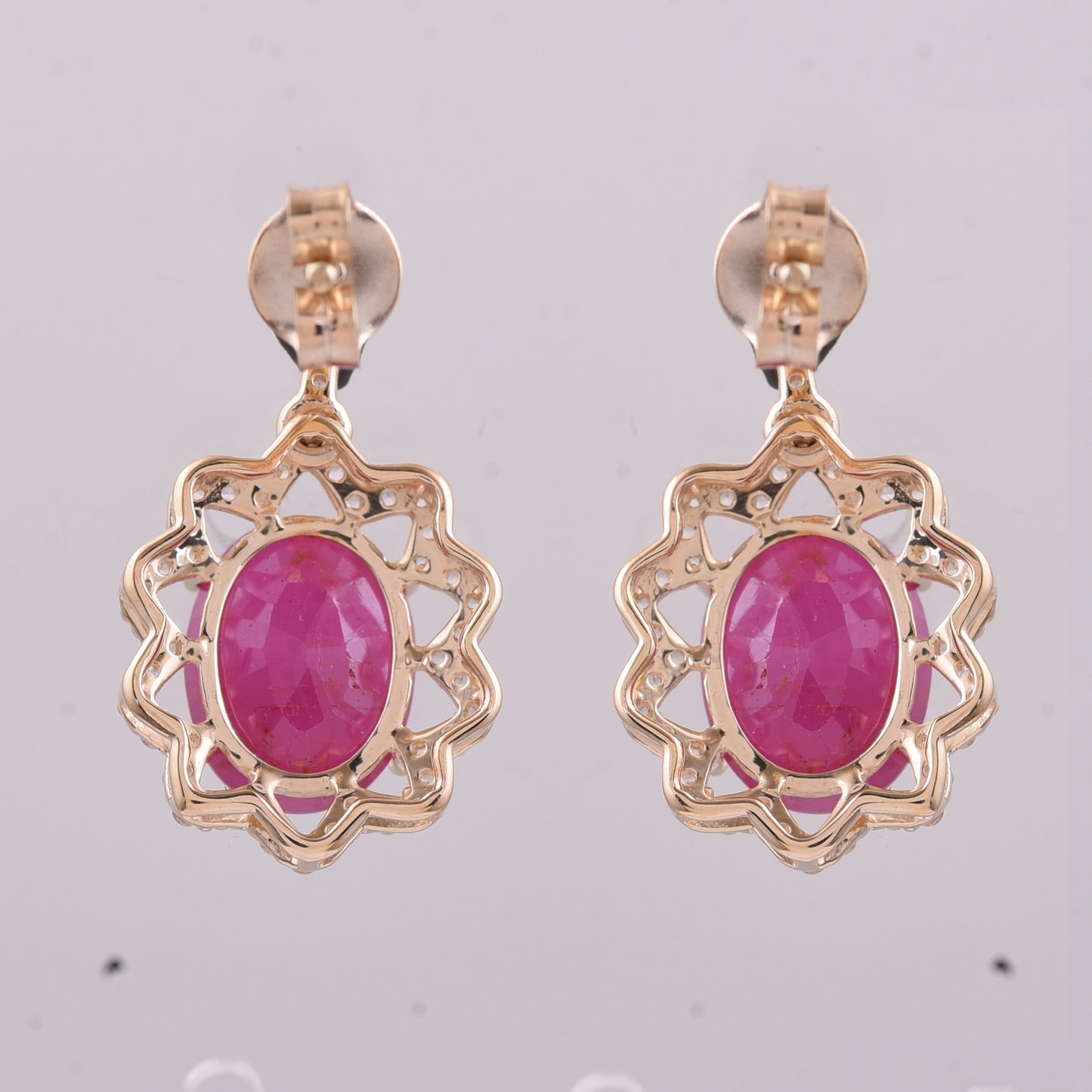 4.58 Ct Oval Ruby 9K Gold Earrings