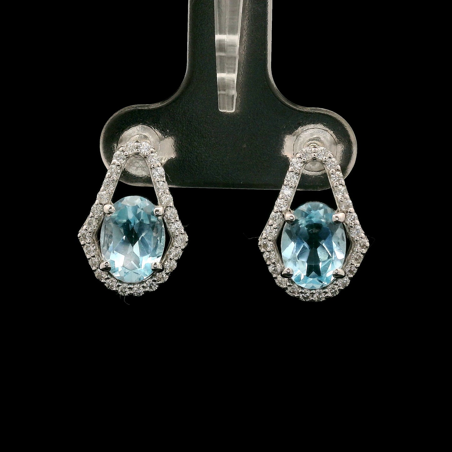 3.44 Ct Oval Blue Topaz, White Zircon 925 Sterling Silver Earrings