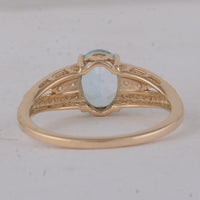 1.75 Ct Oval Blue Topaz 9K Gold Ring